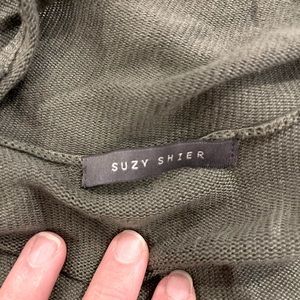 Suzy Sheir - army green cardigan, ruffled bottom